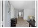 Inviting foyer with neutral walls, tile flooring, and stylish decor creating a welcoming entrance at 8876 Ashwood Dr, Riverdale, GA 30274