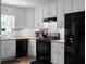 Kitchen equipped with stainless steel appliances, granite counters, and white cabinetry at 8876 Ashwood Dr, Riverdale, GA 30274