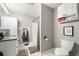 Full bathroom featuring a vanity, a tub with shower, and a toilet at 998 Sisley Trl, White, GA 30184