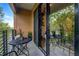 Private balcony with outdoor seating, offering beautiful views and a peaceful spot to unwind at 112 Rogers Ne St # 503, Atlanta, GA 30317