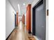 Well-lit hallway with wood-look floors and modern architectural details at 112 Rogers Ne St # 503, Atlanta, GA 30317