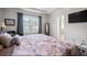 Large main bedroom with natural light, a comfortable sitting area, and a view of the outdoors at 1151 Wisteria Sw Dr, Mableton, GA 30126