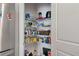 Walk-in pantry with ample shelving for organized storage at 1151 Wisteria Sw Dr, Mableton, GA 30126
