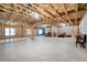 Unfinished basement with exposed ceiling and window at 2417 Tree Arbor Way, Marietta, GA 30064