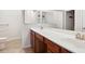Bathroom vanity with dual sinks and wood cabinets at 2417 Tree Arbor Way, Marietta, GA 30064