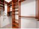 Walk-in closet featuring wooden shelving and ample storage at 2417 Tree Arbor Way, Marietta, GA 30064
