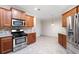 Bright kitchen featuring stainless steel appliances and granite countertops at 2417 Tree Arbor Way, Marietta, GA 30064