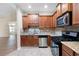 Well-lit kitchen featuring stainless steel appliances and beautiful countertops at 2417 Tree Arbor Way, Marietta, GA 30064