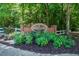 The Heritage at Roswell neighborhood entrance sign surrounded by landscaping at 5210 Davenport Pl, Roswell, GA 30075