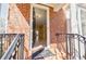 Inviting entryway with hardwood floors and open floor plan, bathed in natural light from nearby windows at 5210 Davenport Pl, Roswell, GA 30075