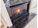 Marble fireplace close-up showcasing the detailed craftsmanship and cozy ambiance at 5210 Davenport Pl, Roswell, GA 30075