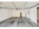 Spacious garage with concrete floors and ample room for parking at 5210 Davenport Pl, Roswell, GA 30075
