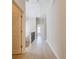 Upstairs hallway with wood flooring and natural light at 5210 Davenport Pl, Roswell, GA 30075