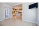 Elegant kitchen with a central island, pendant lighting, and white cabinets at 5210 Davenport Pl, Roswell, GA 30075