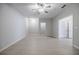 Spacious living room with recessed lights, and closet with double doors at 5210 Davenport Pl, Roswell, GA 30075