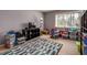 Bedroom features a large window for plenty of natural light and a carpeted floor at 58 Basswood Cir # 29, Atlanta, GA 30328