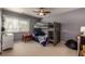 Bedroom featuring a bunkbed with ceiling fan, and a window for plenty of natural light at 58 Basswood Cir # 29, Atlanta, GA 30328