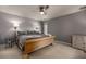 Neutral colored bedroom with plush carpet, fan and light, and modern furnishings at 58 Basswood Cir # 29, Atlanta, GA 30328