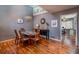 Formal dining room with hardwood floors, elegant chandelier, and access to kitchen at 58 Basswood Cir # 29, Atlanta, GA 30328