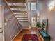Stylish foyer with hardwood floors, staircase, and elegant lighting fixtures at 58 Basswood Cir # 29, Atlanta, GA 30328