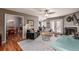 Open living room with a fireplace, sofas, and a dining room view at 58 Basswood Cir # 29, Atlanta, GA 30328