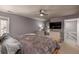 Serene main bedroom featuring soft gray walls, a ceiling fan, and two dressers at 58 Basswood Cir # 29, Atlanta, GA 30328