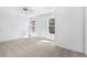 Large carpeted bedroom with lots of bright, natural light from the two windows at 165 River Ridge Ln, Roswell, GA 30075