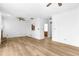 Bright living room featuring hardwood floors, a fireplace, and an open layout perfect for entertaining at 165 River Ridge Ln, Roswell, GA 30075