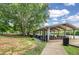 Picturesque picnic shelter with multiple tables offers a perfect spot to relax and enjoy lake views at 165 River Ridge Ln, Roswell, GA 30075
