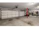 Large two car garage with tools hanging on the wall at 2033 Lee Se Rd, Smyrna, GA 30080