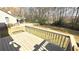 Wooden deck overlooking a spacious, tree-lined backyard, perfect for outdoor relaxation and entertainment at 3185 Haverhill Rowe, Lawrenceville, GA 30044