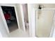 Bathroom featuring a clear glass shower and direct access to the walk-in closet and water closet at 3185 Haverhill Rowe, Lawrenceville, GA 30044