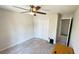 Simple bedroom with a ceiling fan, closet, and neutral-toned walls offering a blank canvas at 3185 Haverhill Rowe, Lawrenceville, GA 30044