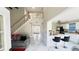 Spacious living area featuring modern decor, open layout, and easy access to the kitchen and staircase at 3185 Haverhill Rowe, Lawrenceville, GA 30044