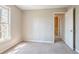 Bedroom with neutral paint, carpet floors, natural light and an entrance at 2072 Arbor Forest Sw Dr, Marietta, GA 30064