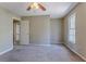 Bedroom with neutral paint, carpet floors, natural light from a window and ceiling fan at 2072 Arbor Forest Sw Dr, Marietta, GA 30064