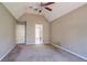 Bedroom featuring carpeted flooring and a connecting door to the bathroom at 2072 Arbor Forest Sw Dr, Marietta, GA 30064