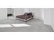 Bright open bedroom featuring plush carpeting, a comfortable bed, and ample natural light at 469 Ralph Still Rd, Dacula, GA 30019