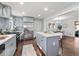 Updated kitchen featuring stainless steel appliances, an island, and hardwood flooring at 399 W Sandtown Sw Rd, Marietta, GA 30064