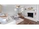 Bright and airy living room with white fireplace, comfortable seating, and modern decor at 399 W Sandtown Sw Rd, Marietta, GA 30064