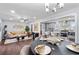 Open-concept living space with modern decor, dining area, and a view of the kitchen with a breakfast bar at 399 W Sandtown Sw Rd, Marietta, GA 30064