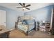 Stylish bedroom with built in bunkbeds, neutral carpet, and shelves, providing ample space and storage at 4020 Inman Park Lane, Buford, GA 30519