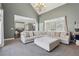 Comfortable living room featuring vaulted ceilings and plush seating with access to the kitchen at 4020 Inman Park Lane, Buford, GA 30519