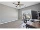 This office space has gray walls, and a large window allowing natural light at 4020 Inman Park Lane, Buford, GA 30519