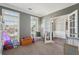 Play room is decorated with grey walls, storage and toys at 4020 Inman Park Lane, Buford, GA 30519