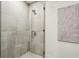 Modern shower with glass enclosure and tiled walls at 2520 Peachtree Rd # 602, Atlanta, GA 30305