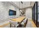 Conference room featuring a long wooden table and modern decor at 2520 Peachtree Rd # 602, Atlanta, GA 30305