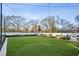 Well-maintained lawn area with outdoor seating and lush landscaping at 2520 Peachtree Rd # 602, Atlanta, GA 30305