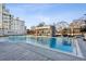 Beautiful community pool with lounge chairs and a covered seating area at 2520 Peachtree Rd # 602, Atlanta, GA 30305