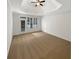 Open bedroom showcasing plush carpeting, white walls, and ample natural light streaming through multiple windows at 3083 Milledge Gate Se Ct, Marietta, GA 30067